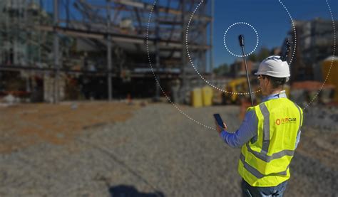 Mobile phone showing construction site progress